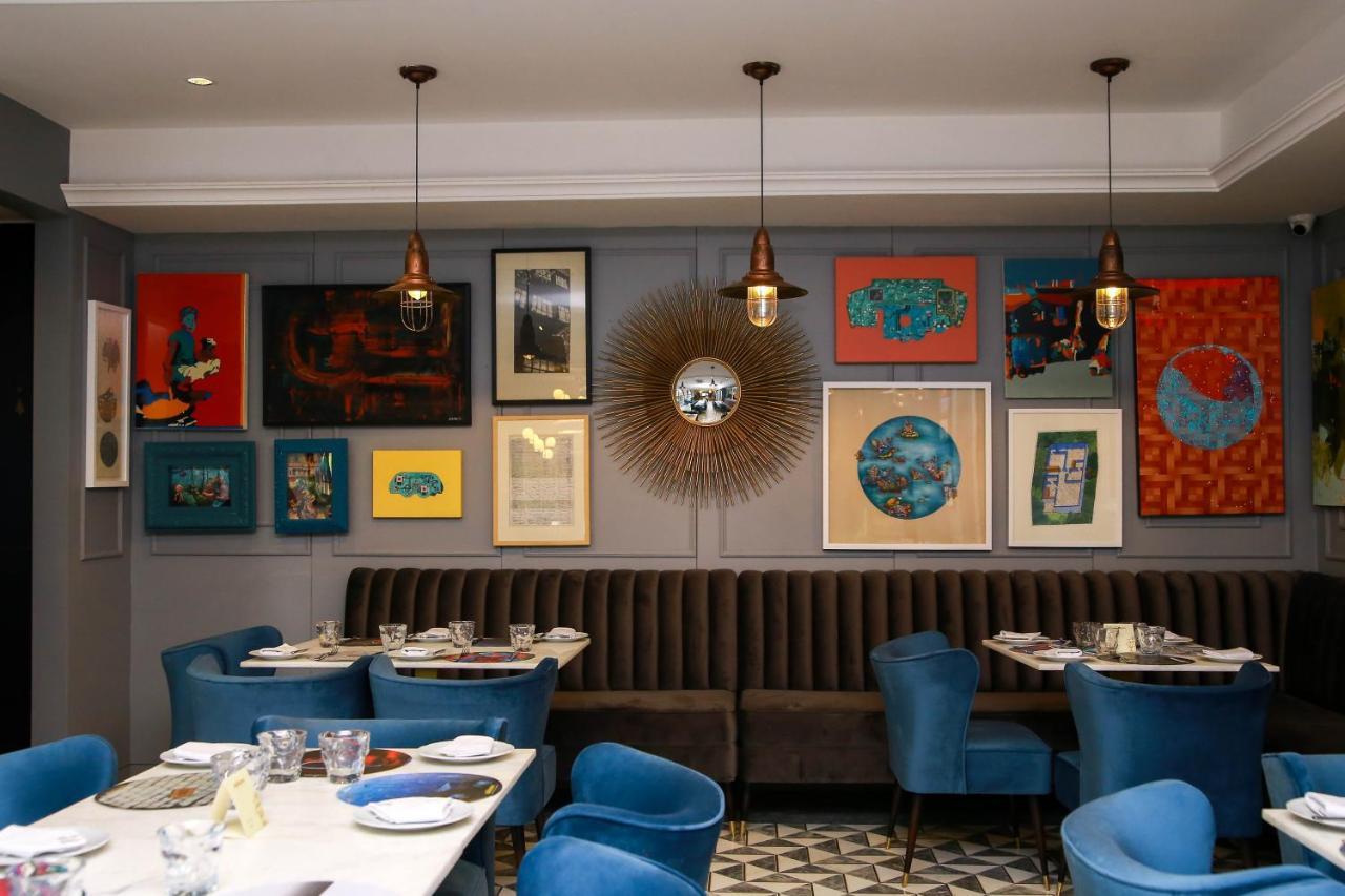 Ambiance Boutique Art Hotel Lahore Eksteriør bilde Interior of the restaurant