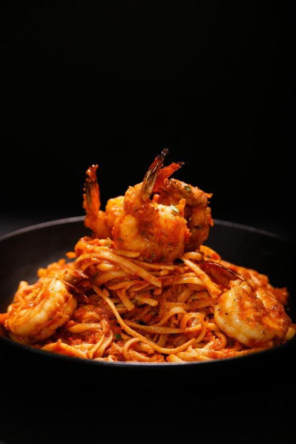 Ambiance Boutique Art Hotel Lahore Eksteriør bilde Shrimp and pasta