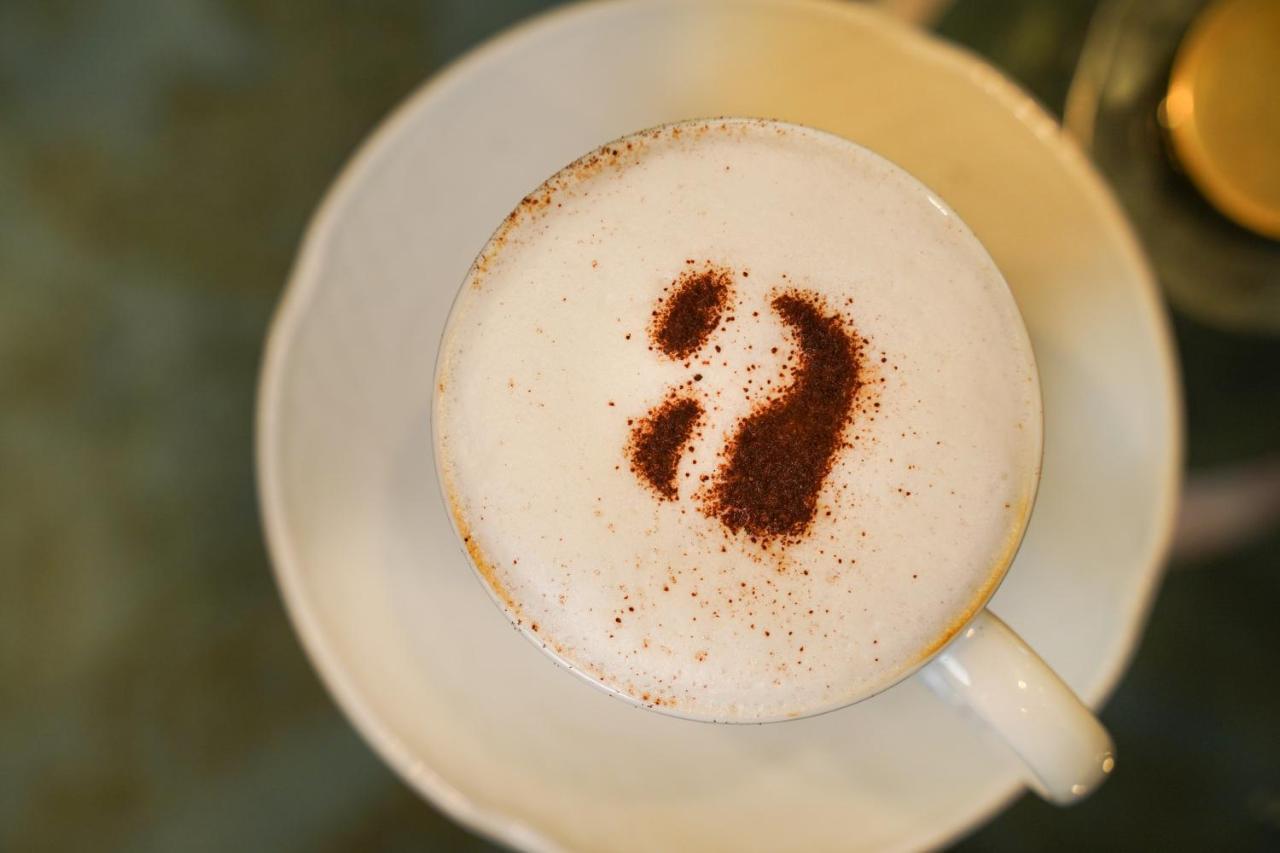 Ambiance Boutique Art Hotel Lahore Eksteriør bilde A cappuccino with a number 2